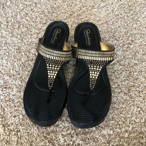 Barely worn black and gold wedge sandals